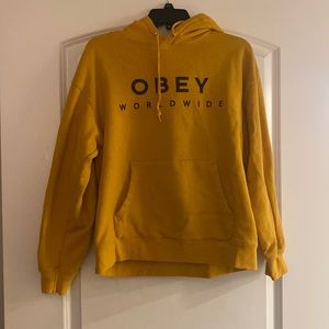 OBEY yellow sweatshirt.